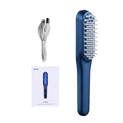 Blue Hair Growth Comb with silicone bristles, USB charging cable, and user manual laid out on a white background