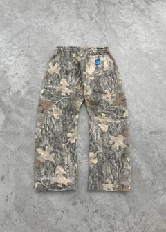 Urban Camo Retro Hoodie with gray and beige camouflage pattern laid flat on a concrete surface