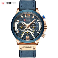Military Leather Chronograph Wristwatch with blue leather strap, rose gold case, and multiple subdials on the blue dial.