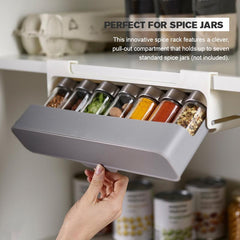 Kitchen Self-Adhesive Wall-Mounted Spice Organizer with pull-out compartment holding seven spice jars in a kitchen pantry.