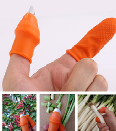 Orange Silicone Finger Plant Blade with a sharp blade for gardening and harvesting tasks on fingertips.