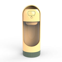 Portable Dog Drinker Bottle in beige and green with a transparent water reservoir and push button top design
