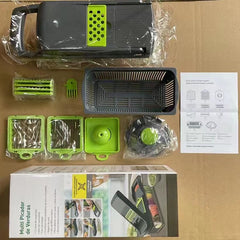 Vegetable Chopper Kitchen set with interchangeable blades, basket, hand guard, and instruction manual on brown surface