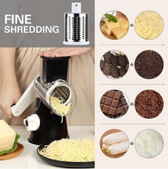 Kitchen Manual Grater shredding cheese, cookies, chocolate, and vegetables into fine pieces with a hand-crank design.