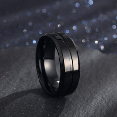 Black glossy modern band with dual groove design on dark textured surface Electroplating Ring