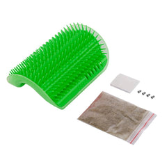 Green plastic Cat Self Groomer Corner Brush with mounting screws, adhesive pad, and a bag of catnip on white background