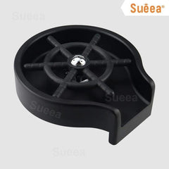 Black circular Glass Rinser Automatic Cup Washer with metal center nozzle and rubber spokes for rinsing cups.