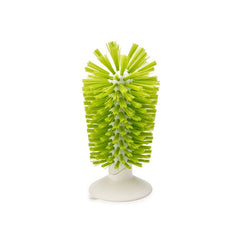 Green bristle Kitchen Bottle Brush with white handle and suction base for cleaning bottles and narrow containers.