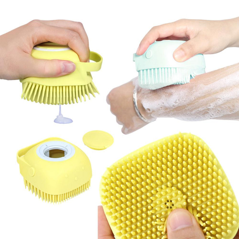 Hands using yellow and blue Cute Dog Bath Brush with soft silicone bristles dispensing soap and scrubbing skin.