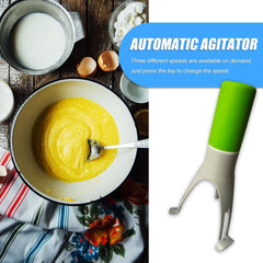 3 Speed Gear Automatic Egg Beaters with green handle beside bowl of beaten eggs and baking ingredients on table