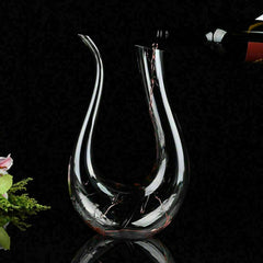 Crystal U-shaped 1500ml Wine Decanter with wine being poured, elegant glass design on black background