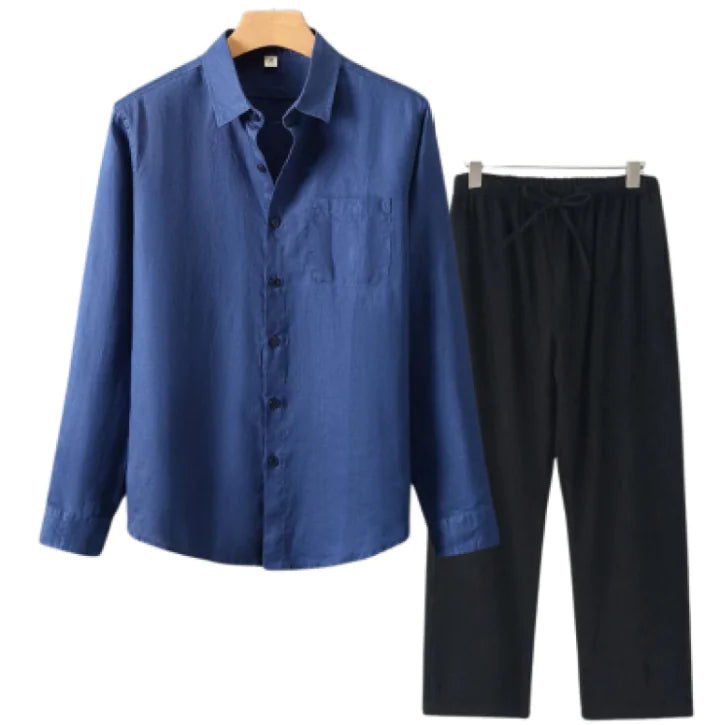 Men's Solid Color Suit featuring a blue button-up shirt and black pants displayed on hangers.